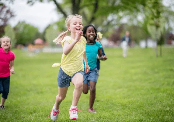 Three kids running around during Parents for Public Education's Teacher Kid Camp